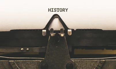 Fotobehang Geschiedenis, Tekst op papier in vintage typemachine uit de jaren 20 © MichaelJBerlin