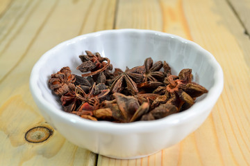 Star Anise Spice isolated on wooden background