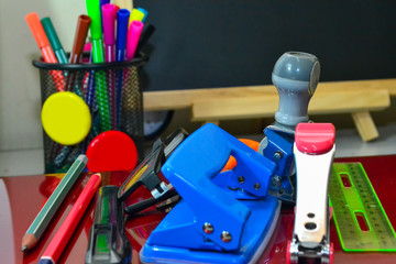 School supplies isolated on wooden background