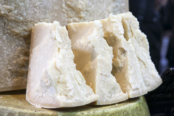 Parmigiano Reggiano and other Italian produce on sale on a stall in Borough Market