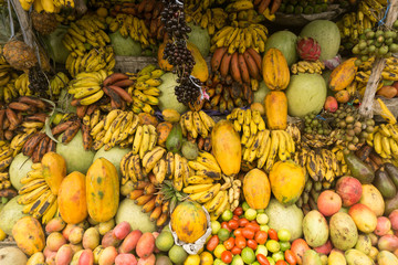 Fruits shop on tropical marketplace