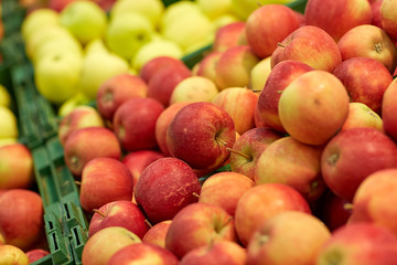 ripe apples at grocery store or market