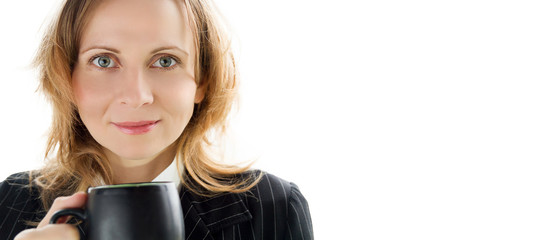 Young beautiful woman holding a cup of cofe