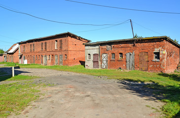 Fototapeta na wymiar Old brick sheds of the German construction. Znamensk, Kaliningrad region
