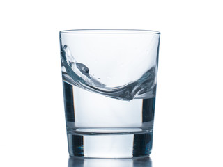 water splashing from glass isolated on white background