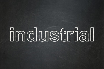 Obraz premium Industry concept: Industrial on chalkboard background