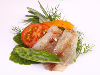Roll with herring.Herring on pertse.esklyuziv dish of ryby.File capelin. Preservation of Herring.