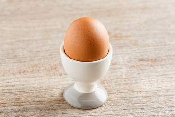 Egg in ceramic cup