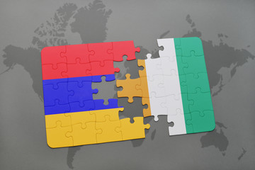 puzzle with the national flag of armenia and cote divoire on a world map