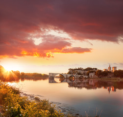 Fototapeta premium Avignon old bridge against colorful sunset in Provence, France