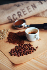 Top view cup of coffee and three different varieties