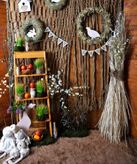 Beautiful interior. Decor. Easter. Green grass. Vases.
