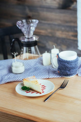 triangle cheese cakes in cafe. On a wooden table