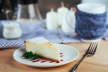 triangle cheese cakes in cafe. On a wooden table