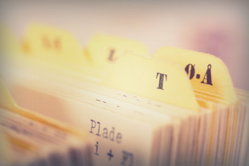 Close up of alphabetical index cards in box