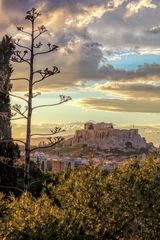 Fotobehang Parthenon temple on the Acropolis against colorful sunset in Athens, Greece © Tomas Marek