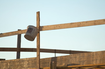 Lath and Bucket on the Construction Site