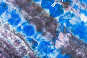 Fototapeta na wymiar abstract blue and violet striped pattern on batik