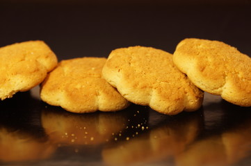 sweet corn cookies isolated on a dark background