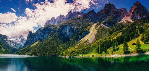 Naklejka na ściany i meble Mountain lake between by mountains. Italy. Europe