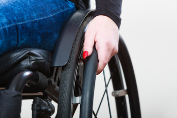 Person sitting on wheelchair.