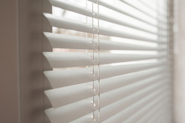 white metal blinds in the office
