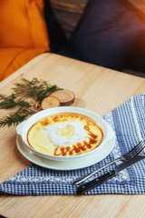 Delicious cheese casserole in a ceramic pot.