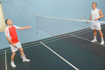 men playing badminton