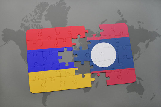 puzzle with the national flag of armenia and laos on a world map