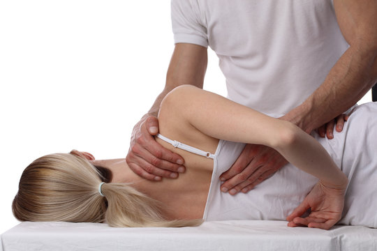 Chiropractic, osteopathy, dorsal manipulation. Therapist doing healing treatment on women's back . Alternative medicine, pain relief concept isolated on white.