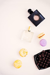 Woman's make up cosmetics and perfumes on white background