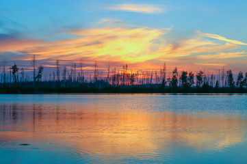 magic colors sunset on the lake reflection forest