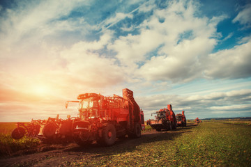 Obraz premium tractors working in the field. Carpathians. Ukraine Europe