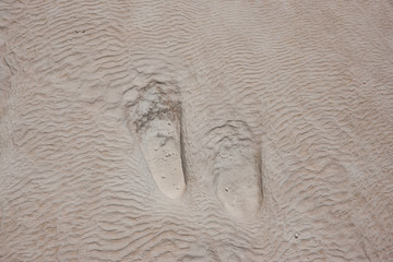 old footprints on a stone background