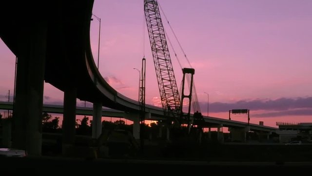 Driving on the highway through Philadelphia as the sun sets. Slow Motion 240fps