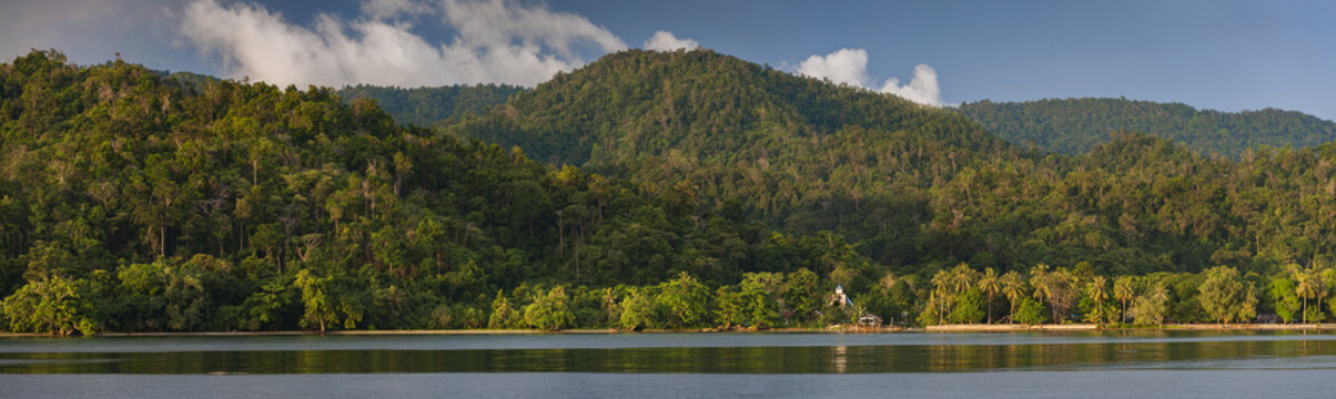 Aduwey Village on Misool Island, Raja Ampat, Indonesia. A sunrise view of Aduwey village in the remote area of Raja Ampat on the Island of Misool. Raja Ampat boasts the greatest biodiversity anywhere.