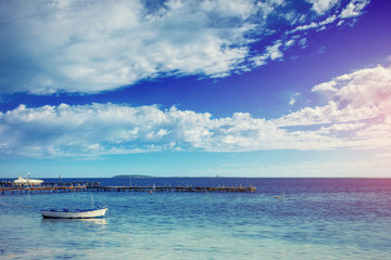 Beautiful summer scene of calm seas and boat