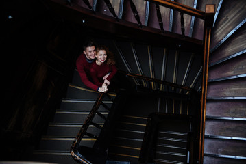 couple of young people on the wooden stairs