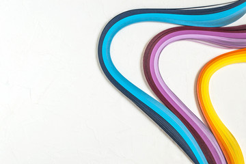 Bright multi-colored strips for quilling