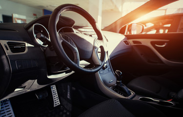 Modern car interior dashboard and steering wheel