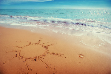 drawings in the sand on the beach