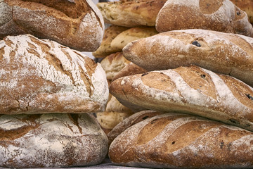 A stack of artisan bread loaves - detail