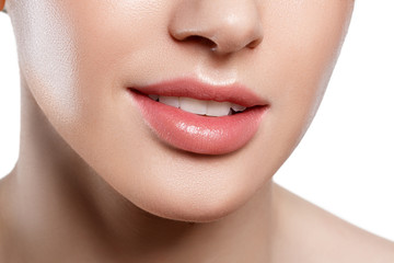Perfect natural lip makeup. Close up macro photo with beautiful female mouth. Plump full lips.