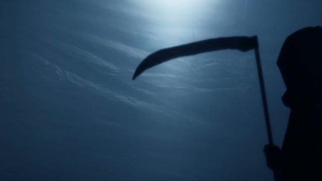 Unstoppable Grim Reaper carrying sharp scythe to punish evil-doers, horror film