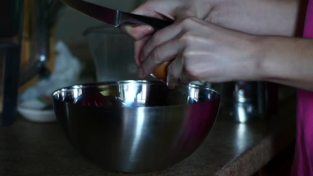 Woman Hands Break Eggs In A Bowl