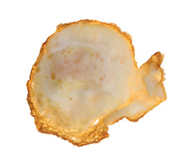 A single fried egg isolated on a white background.