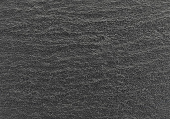 Black slate table top close view.