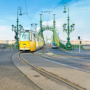 Historic tram on Freedom Bridge in Budapest, Hungary