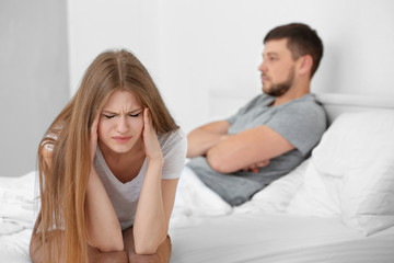 Depressed couple after quarrel