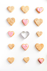 cookies for Valentine Day heartshaped white background top view pattern